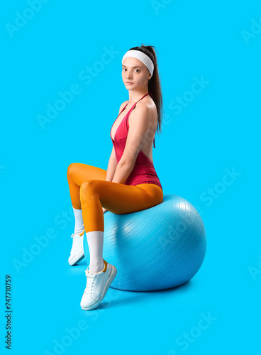 Sporty young woman with fit...