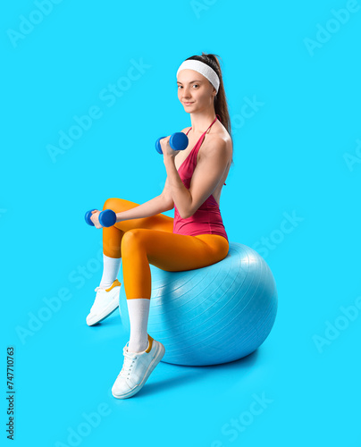 Sporty young woman with fit...