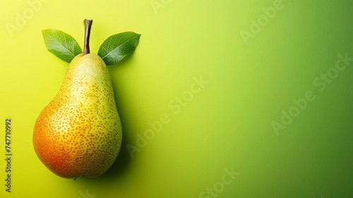 Ripe pear with leaves on green background. Top view with copy space,Fresh green pear with water drops on green background with copy space
