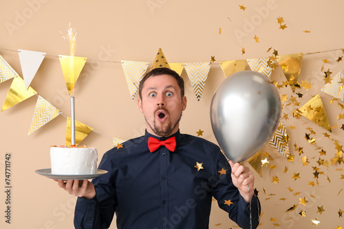 Surprised man with birthday...