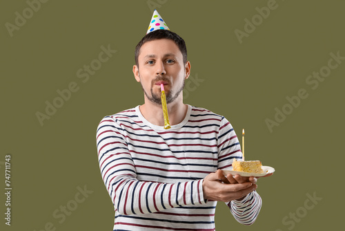 Man with birthday cake and ...