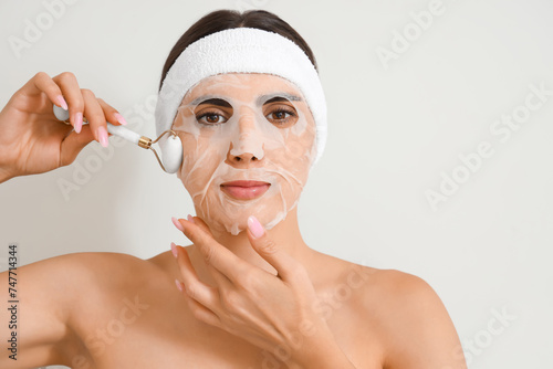 Pretty young woman with fac...