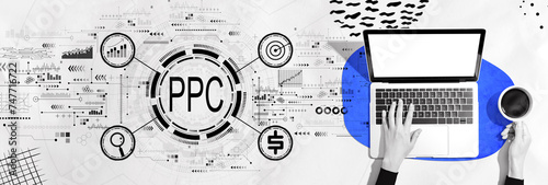 PPC - Pay per click concept with person using a laptop computer photo