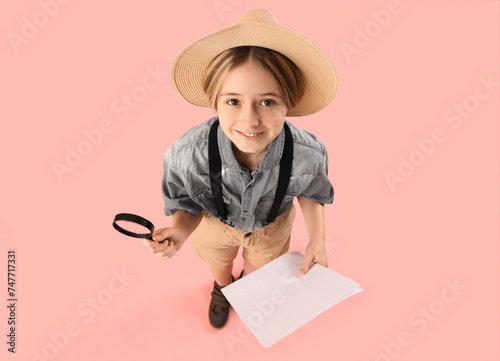 Little actor with magnifier...