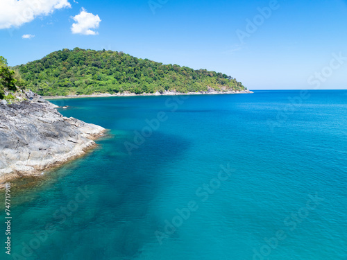 Amazing tropical seashore landscape background,Top view waves crashing on rocks © panya99