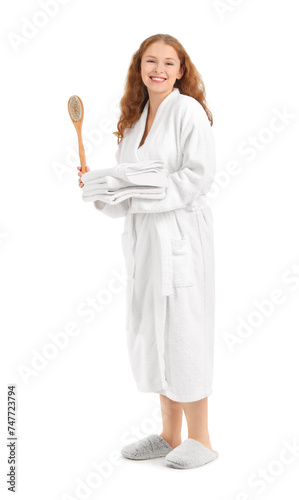 Smiling young woman in whit...
