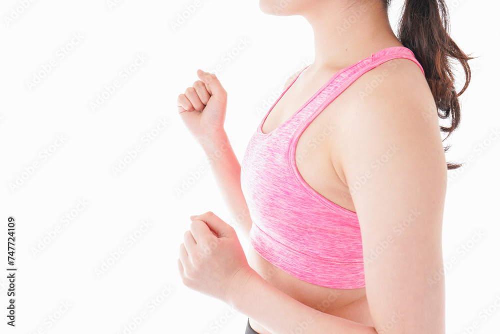 ランニングをする若い女性 ランニングをする若い女性