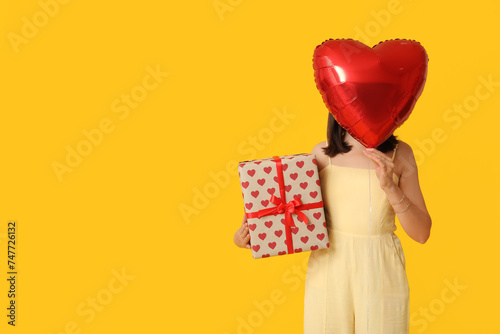 Beautiful young woman with ...
