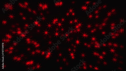 Animation of red starry shaped bokeh with cromatic distortion photo
