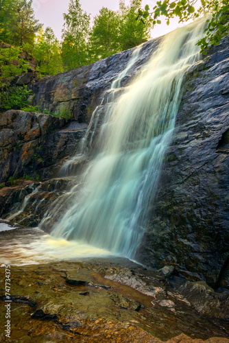 Gadelsha waterfall is the largest waterfall in the Southern Urals on a summer sunny day