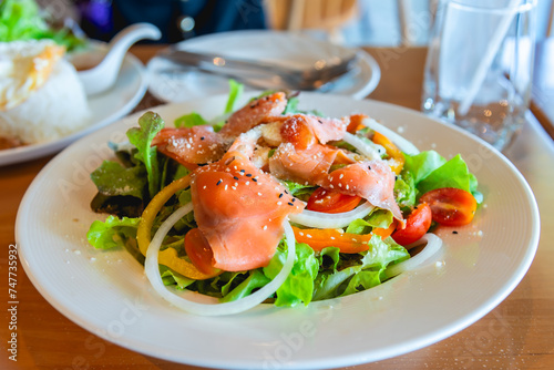 Salmon salad,close up image, clean eating fresh salmon and salad vegetable healthy food diet concept.