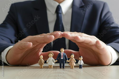 businessman with family model family insurance symbol bokeh style background