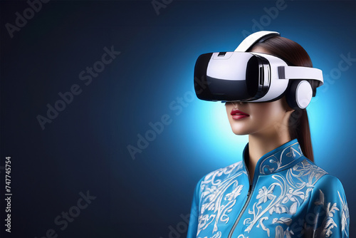 Augmented reality concept, web-banner. Beautiful asian woman in a traditional Asian robe using wireless VR headset on dark background. VR technology. virtual reality glasses