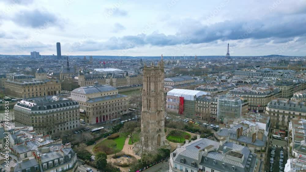 Saint-Jacques Tower and square with Tour Eiffel in background, Boulevard de Sebastopol at Paris in France. Aerial drone view and sky for copy space Saint-Jacques Tower and square with Tour Eiffel in background, Boulevard de Sebastopol at Paris in France. Aerial drone view and sky for copy space