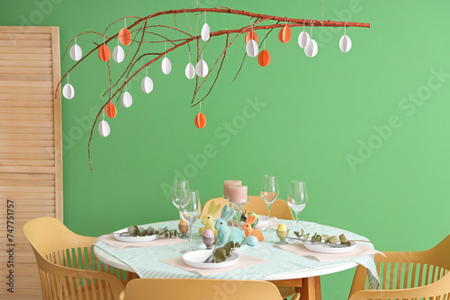 Beautiful table setting for Easter celebration in dining room