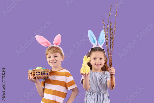 Happy children wearing bunn...