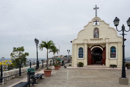 View of the small chapel located at the top of Santa Ana Hill, a popular tourist zone in Guayaquil, Ecuador's largest city and economic capital photo