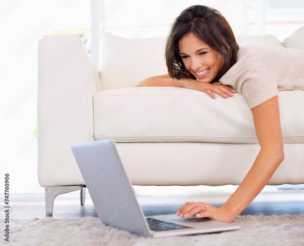 Woman, lying and relax on sofa with laptop on floor for scroll, search or streaming in home living room. Girl, person and reading on couch with computer on carpet for movies, show or happy in house Woman, lying and relax on sofa with laptop on floor for scroll, search or streaming in home living room. Girl, person and reading on couch with computer on carpet for movies, show or happy in house