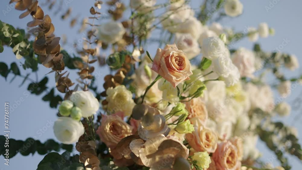 flowers in the wind. Close-up bouquet fresh roses flowers pastel wedding arch details. flowers in the wind. Close-up bouquet fresh roses flowers pastel wedding arch details.