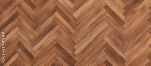 A wood floor featuring a chevron pattern in a light brown herringbone design. The interlocking zig-zag boards create a visually appealing and structured look.