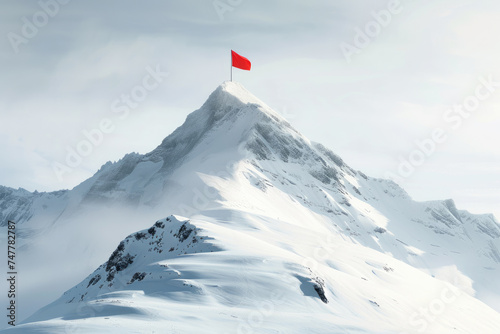 Red flag on the top of mountains covered with snow