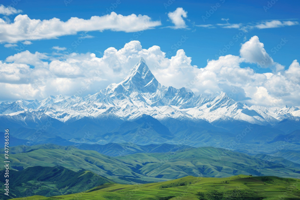 Scenic view of mountain with snow capped peak