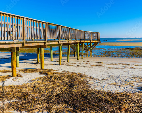 Pier Overlooking Port Royal Sound and The Mud Flats of Fish Haul Beach, Hilton Head, South Carolina, USA