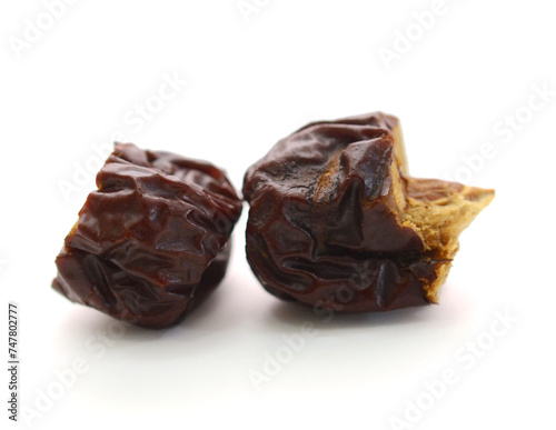 Raisins on a white background - stock photo
