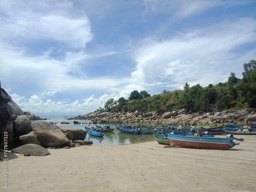 Obraz premium Blue fishing boat on the Turun Aban beach