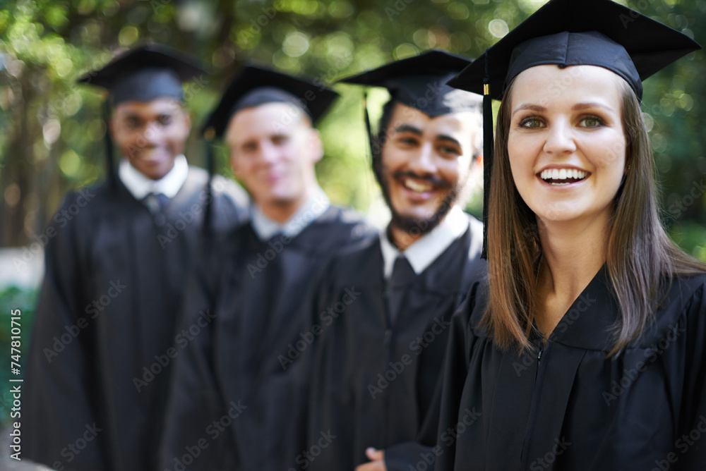 Graduation, classmates and woman for portrait, ceremony and students for education and college for campus. Outdoor, degree and celebration for university, friends and together with cap and gown Graduation, classmates and woman for portrait, ceremony and students for education and college for campus. Outdoor, degree and celebration for university, friends and together with cap and gown