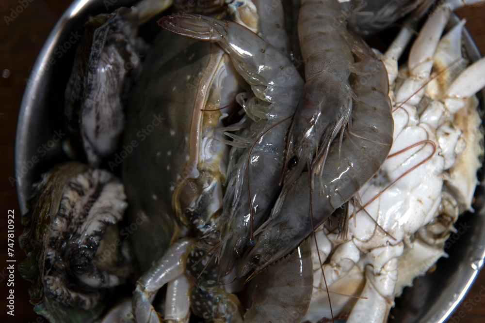 Food materials and ingredients for seafood stew in the pot Food materials and ingredients for seafood stew in the pot