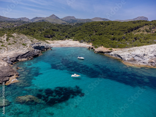 Fototapeta Naklejka Na Ścianę i Meble -  pleasure boats at anchor , protected natural area, capdepera, Mallorca, Balearic Islands, Spain