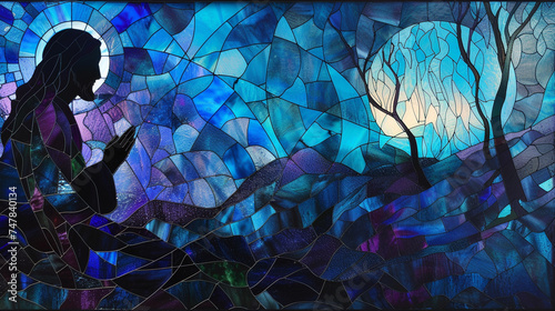 Design a stained glass window capturing the solemn moment of Jesus praying in the Garden of Gethsemane, with dark blues and purples to reflect the night and the intensity of the moment