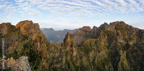 Panoramic view of the mountains adjacent to Pico do Areeiro on a blue sky day on the island of Madeira