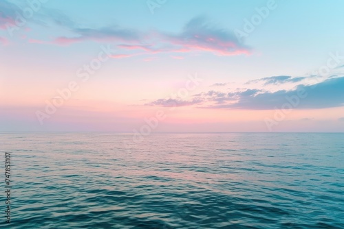 A photograph showing a vast body of water reflecting the colors of a cloudy sky at sunset, Subtle hues of a dusk sky over an open ocean, AI Generated © Iftikhar alam
