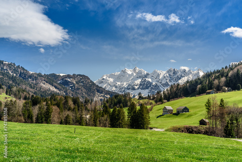 View to the snowcapped Saentis in the Alpstein mountains, Ennetbuehl, Canton Sankt Gallen, Switzerland photo