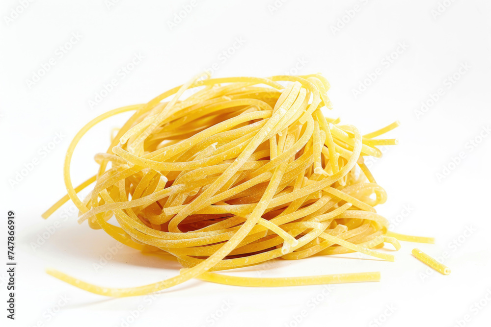 A nest of raw spaghetti strands on a pure white background
