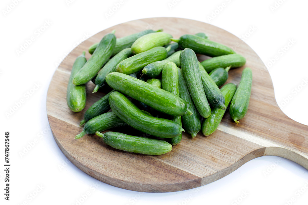 Mini cucumbers on white background. Mini cucumbers on white background.