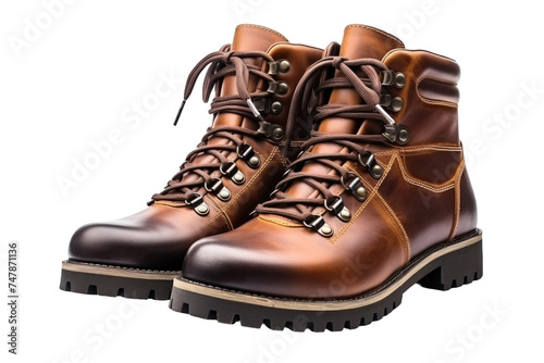 Brown Boots. This image features a pair of brown boots. The boots are sturdy and well worn, showcasing a classic style.