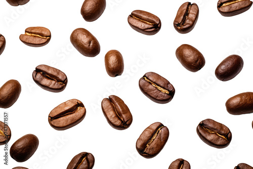 A Bunch of Coffee Beans. Numerous coffee beans are scattered on a plain white background. The beans vary in shades of brown  showcasing their raw and natural appearance.