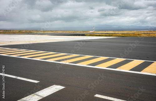 Photo of the runway on Baltra Island, selective focus, Galapagos Islands, Ecuador. photo