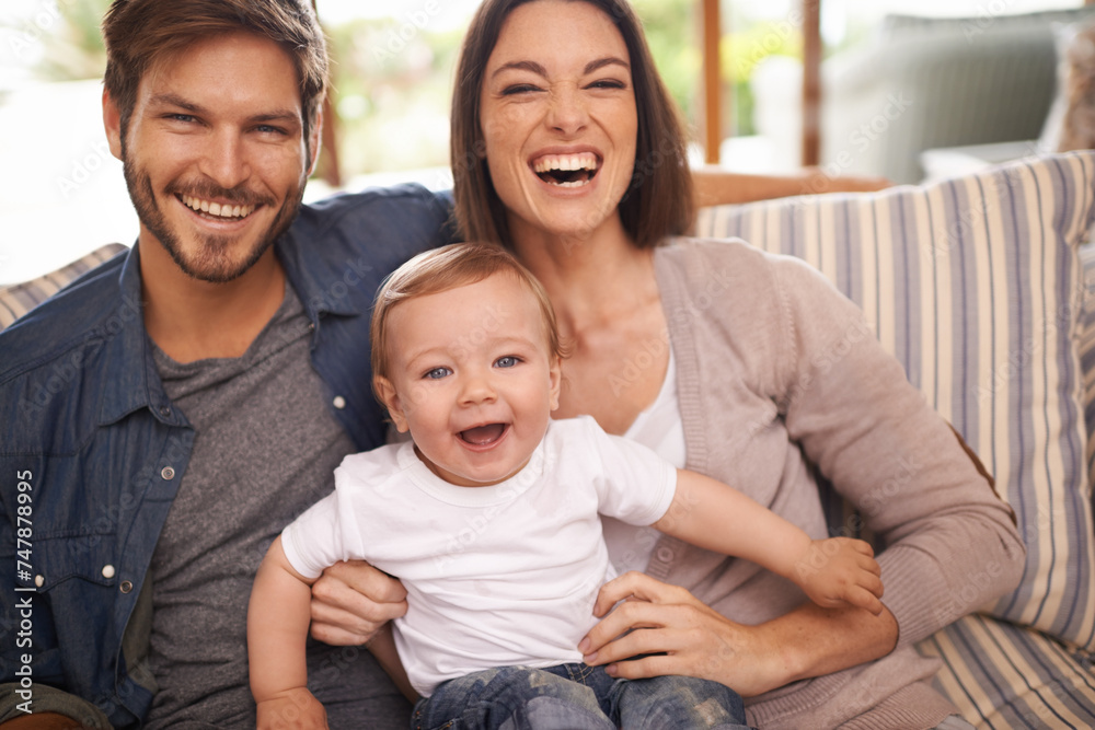 Laughing, happy family or portrait of baby on sofa in home for support, security or bonding in living room. Parents, boy or toddler with mom or father for love or care for child development or growth Laughing, happy family or portrait of baby on sofa in home for support, security or bonding in living room. Parents, boy or toddler with mom or father for love or care for child development or growth