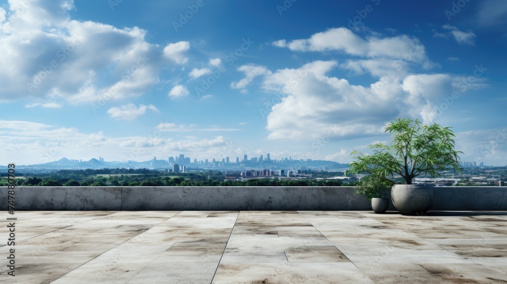 A large empty platform on the roof of a building with a panoramic view of a huge beautiful city.
