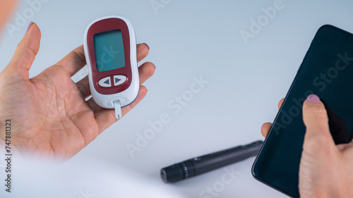 Utilizing digital health technology for checking blood glucose levels, a crucial step in managing diabetes effectively