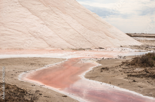 Pink salins d’Aigues-Mortes, Camargue, France. Europe's largest salt marshes Salin-de-Giraud, sea salt production.