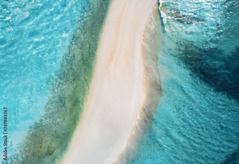 Aerial view of a beautiful sandy beach with turquoise water