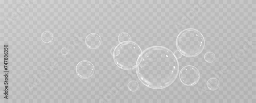 Realistic soap bubbles.Flying bubbles on a transparent background.	