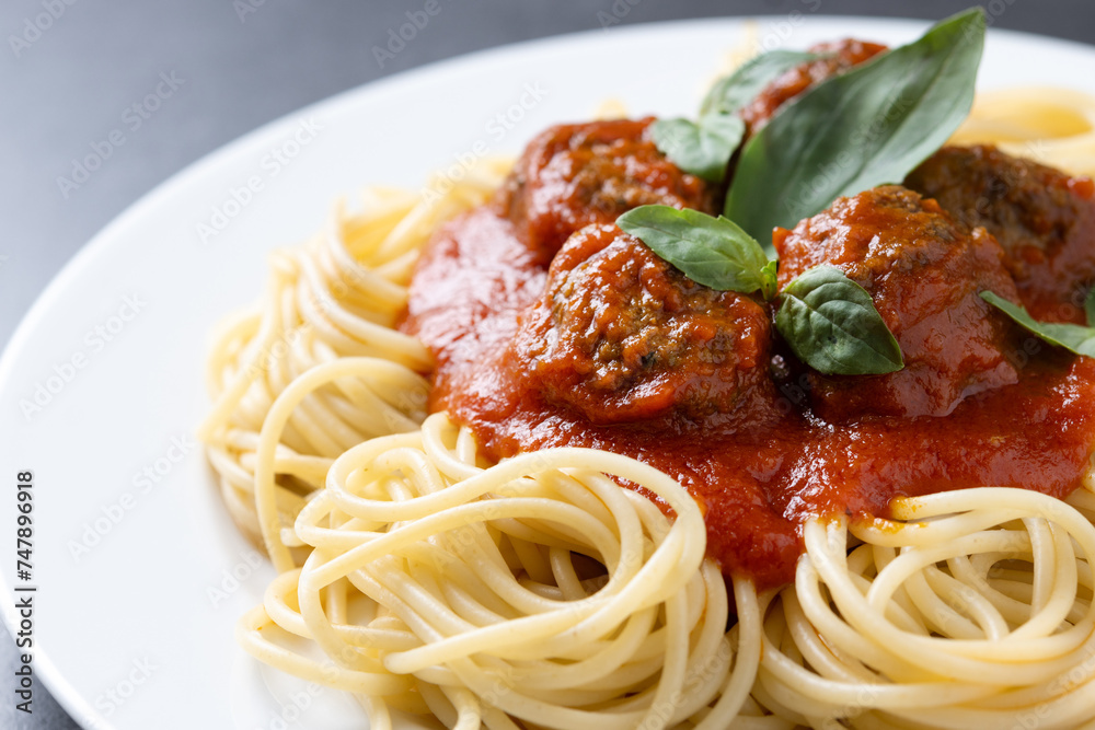 Spaghetti with meatballs isolated on black background. Close up Spaghetti with meatballs isolated on black background. Close up