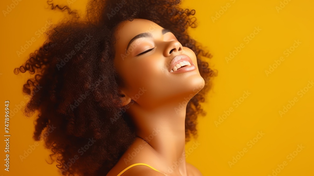 Stylish African American Fashion Model profile portrait. Satisfied brunette woman wearing afro hairstyle, yellow eyeshadow, lips, and makeup on colorful background. - obrazy, fototapety, plakaty 