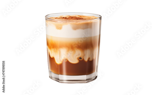 A tall glass is filled with a liquid, likely a beverage, and garnished with a sprinkle of cinnamon on top. The cinnamon adds a warm, spicy aroma and flavor to the drink.